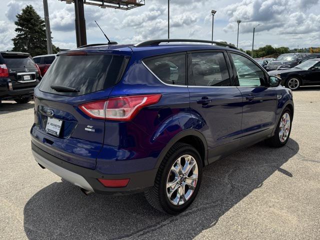 Photo of 2014 Deep Impact Blue Ford Escape