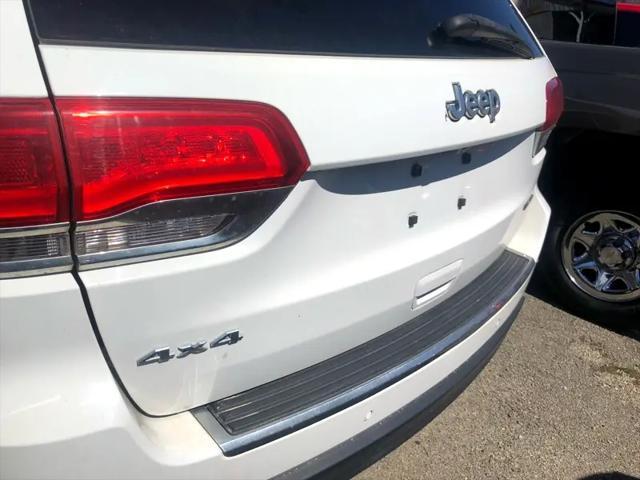 Photo of 2014 Bright White Clearcoat Jeep Grand Cherokee