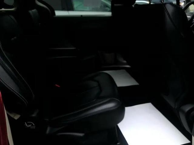 Photo of 2021 Burgundy Chrysler Voyager