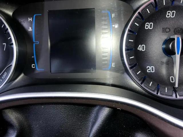 Photo of 2021 Burgundy Chrysler Voyager