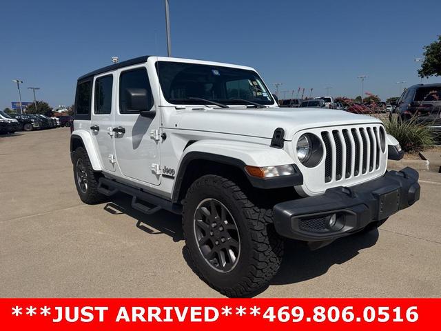 Photo of 2021 Bright White Clearcoat Jeep Wrangler Unlimited