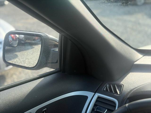 Photo of 2014 Ingot Silver Metallic Ford Explorer