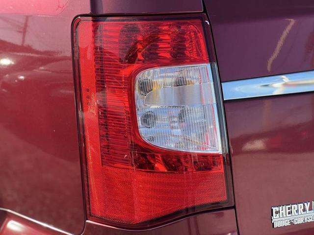 Photo of 2011 Deep Cherry Red Crystal Pearlcoat Chrysler Town & Country