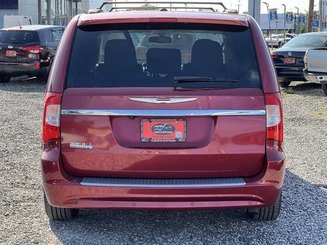 Photo of 2011 Deep Cherry Red Crystal Pearlcoat Chrysler Town & Country