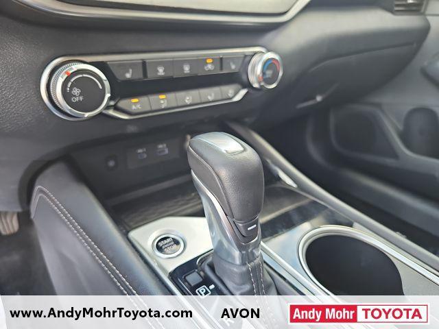 Photo of 2024 Pearl White Tricoat Nissan Altima
