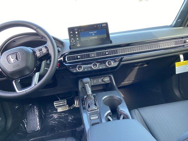 Photo of 2025 Solar Silver Metallic Honda Civic Hybrid