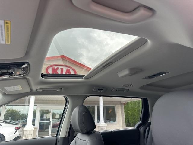 Photo of 2026 Blue Kia Carnival Hybrid