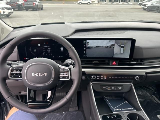 Photo of 2026 Blue Kia Carnival Hybrid
