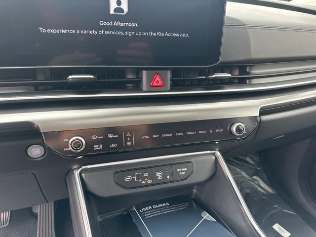 Photo of 2026 Blue Kia Carnival Hybrid
