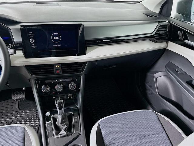 Photo of 2025 Deep Black Pearl Effect Volkswagen Taos