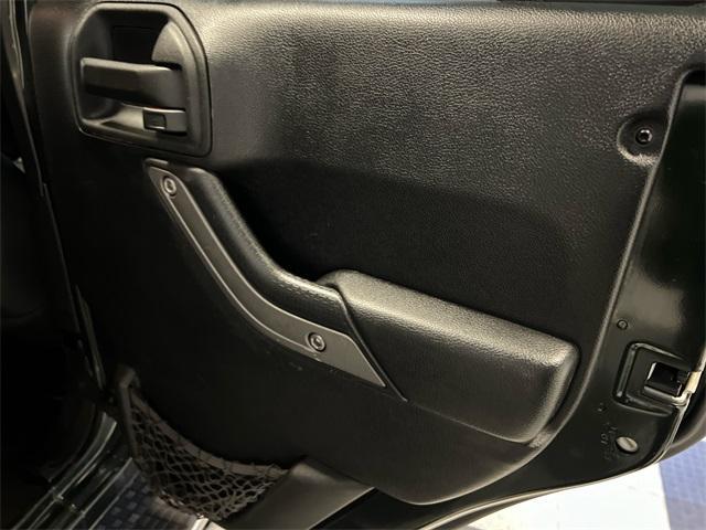 Photo of 2011 Green Jeep Wrangler Unlimited