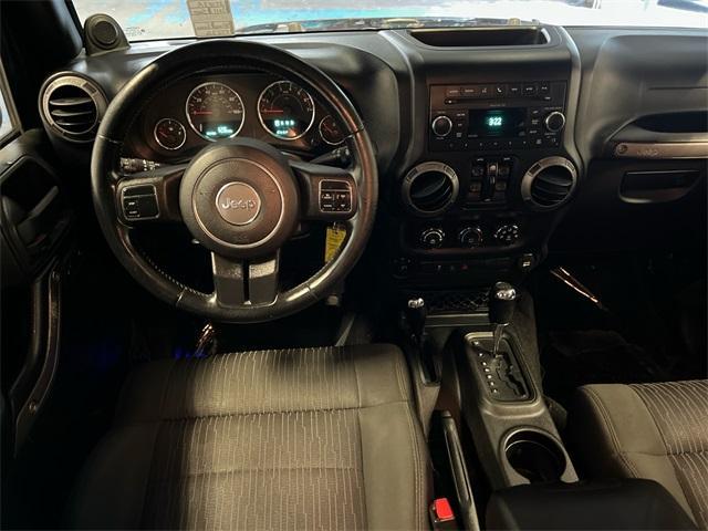 Photo of 2011 Green Jeep Wrangler Unlimited