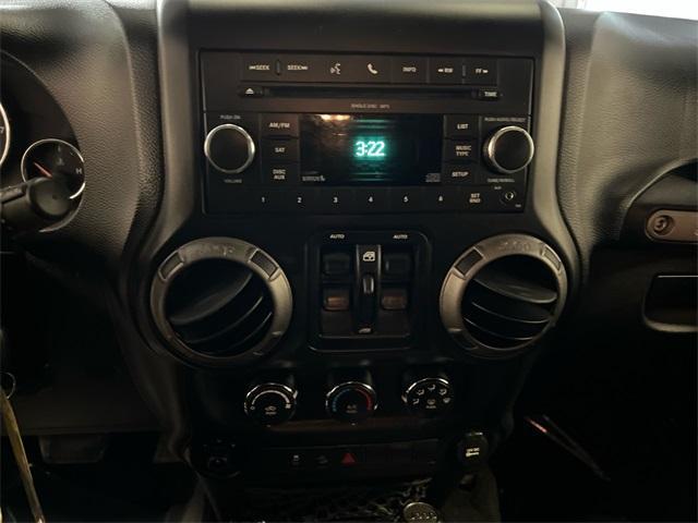 Photo of 2011 Green Jeep Wrangler Unlimited