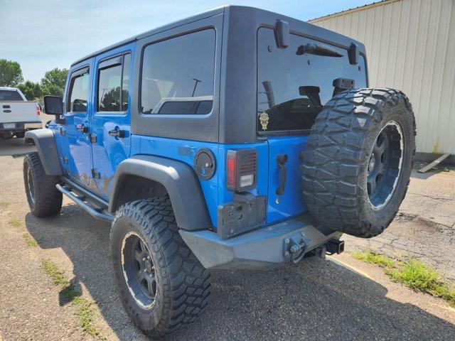 Photo of 2012 Cosmos Blue Jeep Wrangler Unlimited