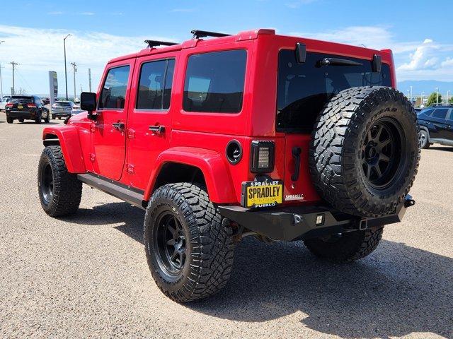 Photo of 2014 Flame Red Clearcoat Jeep Wrangler Unlimited
