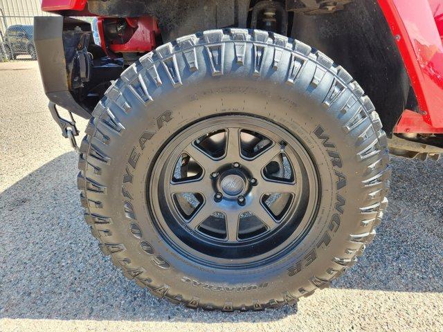 Photo of 2014 Flame Red Clearcoat Jeep Wrangler Unlimited