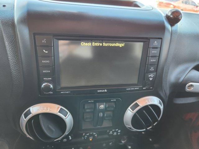 Photo of 2014 Flame Red Clearcoat Jeep Wrangler Unlimited