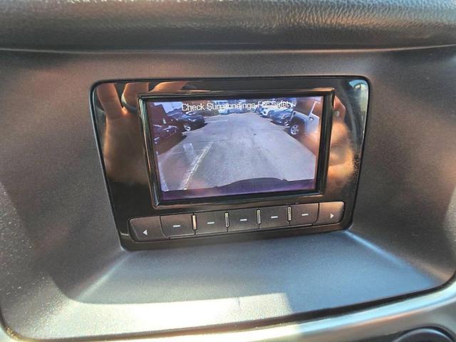 Photo of 2015 Burgundy Chevrolet Tahoe