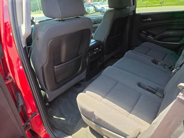 Photo of 2015 Burgundy Chevrolet Tahoe