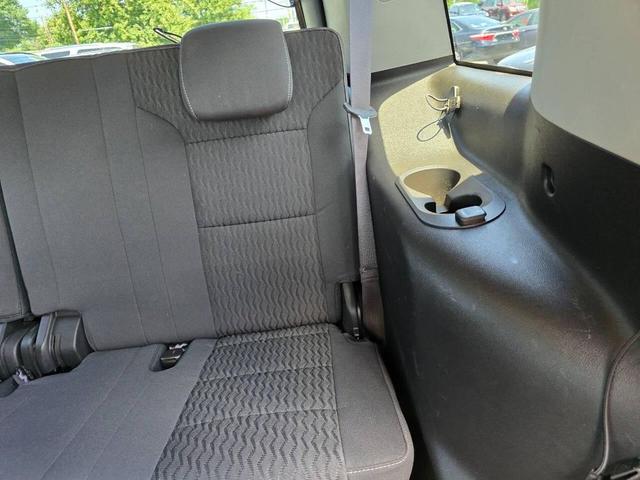 Photo of 2015 Burgundy Chevrolet Tahoe