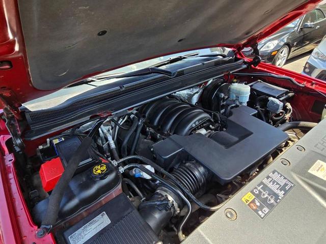 Photo of 2015 Burgundy Chevrolet Tahoe