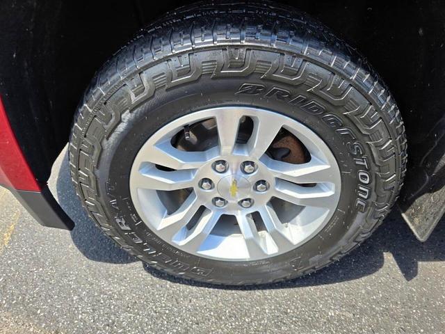 Photo of 2015 Burgundy Chevrolet Tahoe