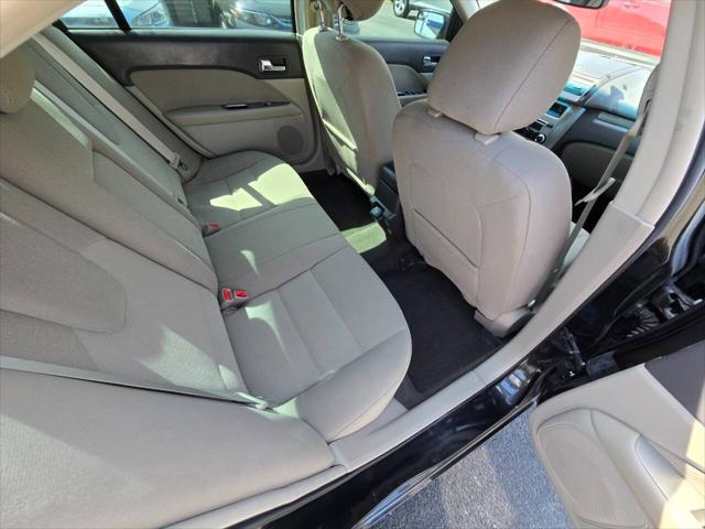 Photo of 2012 Black Ford Fusion Hybrid