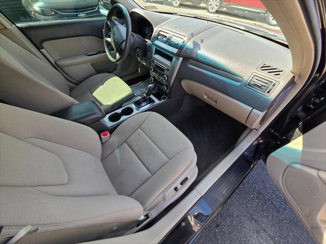 Photo of 2012 Black Ford Fusion Hybrid
