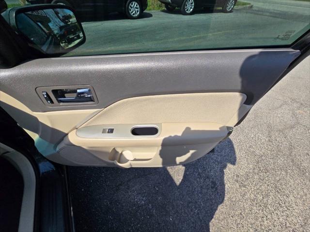 Photo of 2012 Black Ford Fusion Hybrid