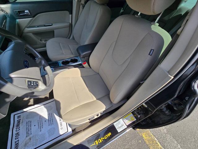 Photo of 2012 Black Ford Fusion Hybrid