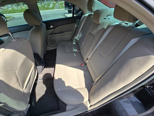 Photo of 2012 Black Ford Fusion Hybrid