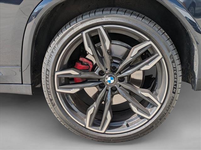 Photo of 2024 Carbon Black Metallic BMW X4