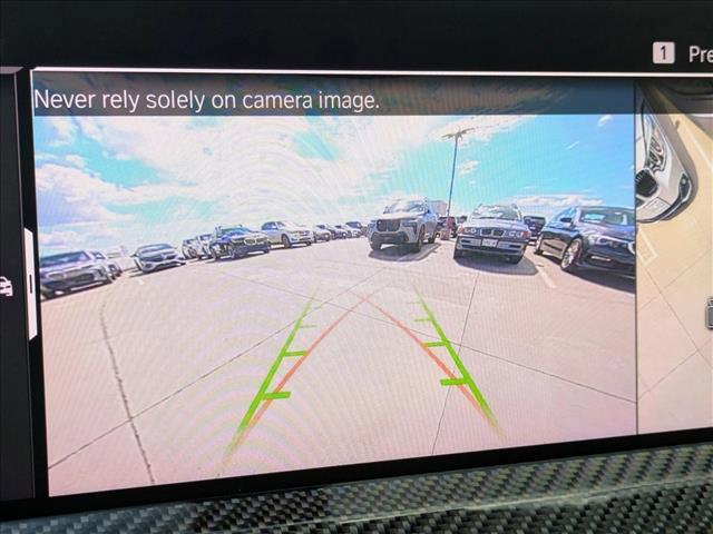 Photo of 2024 Carbon Black Metallic BMW X4