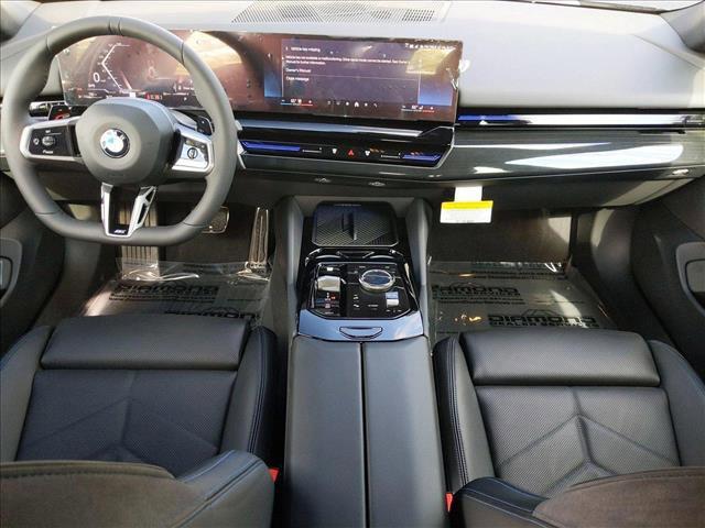 Photo of 2025 Oxide Grey Metallic BMW 530
