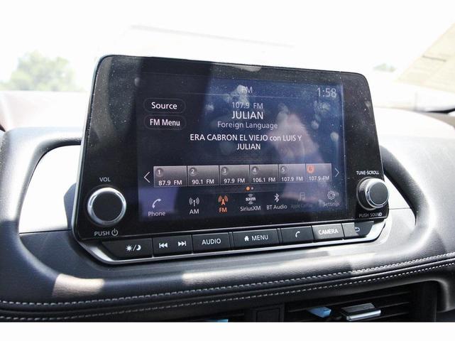 Photo of 2023 Scarlet Ember Tintcoat Nissan Rogue