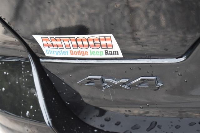 Photo of 2024 Diamond Black Crystal Pearlcoat Jeep Grand Cherokee