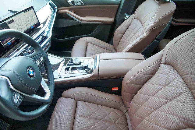 Photo of 2025 Manhattan Green Metallic BMW X5