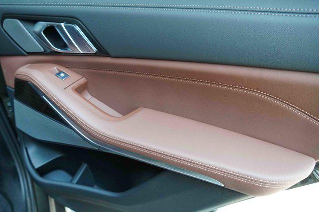 Photo of 2025 Manhattan Green Metallic BMW X5