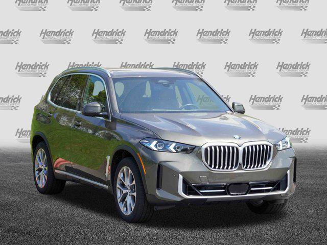 Photo of 2025 Manhattan Green Metallic BMW X5