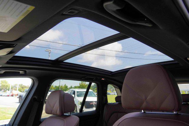 Photo of 2025 Manhattan Green Metallic BMW X5