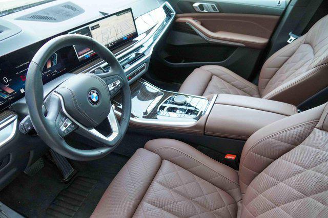Photo of 2025 Manhattan Green Metallic BMW X5