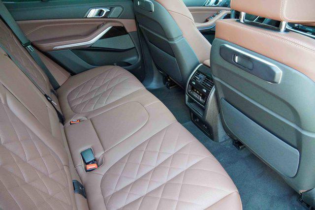 Photo of 2025 Manhattan Green Metallic BMW X5