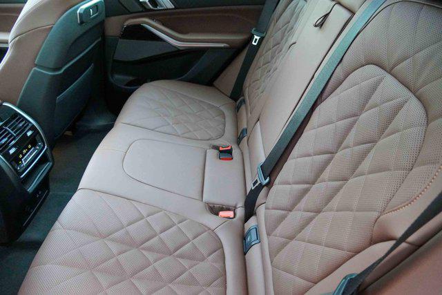 Photo of 2025 Manhattan Green Metallic BMW X5