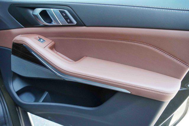 Photo of 2025 Manhattan Green Metallic BMW X5