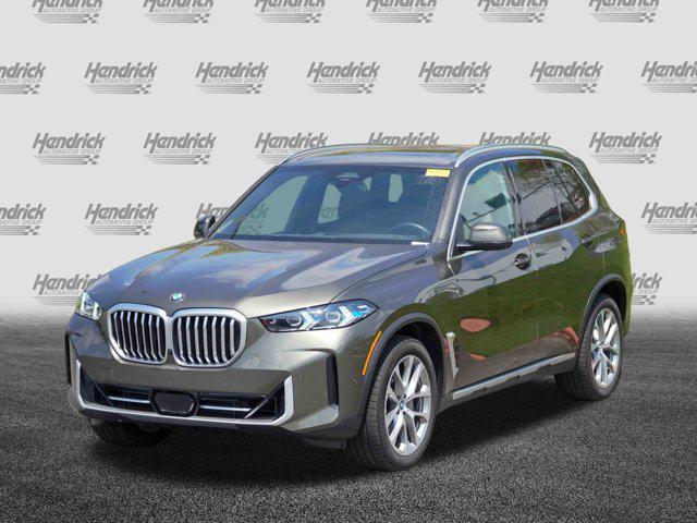 Photo of 2025 Manhattan Green Metallic BMW X5