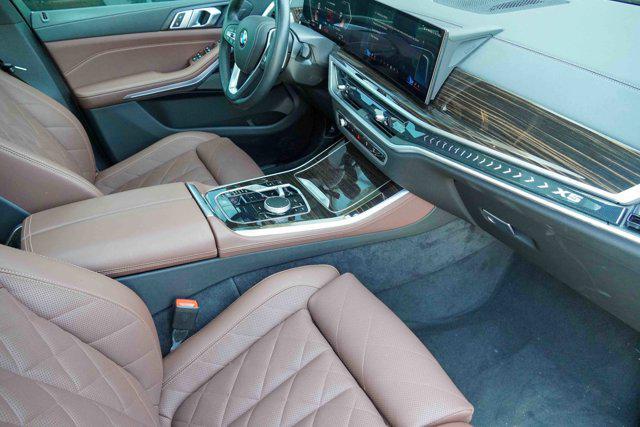 Photo of 2025 Manhattan Green Metallic BMW X5
