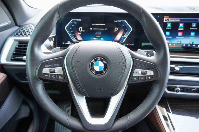 Photo of 2025 Manhattan Green Metallic BMW X5