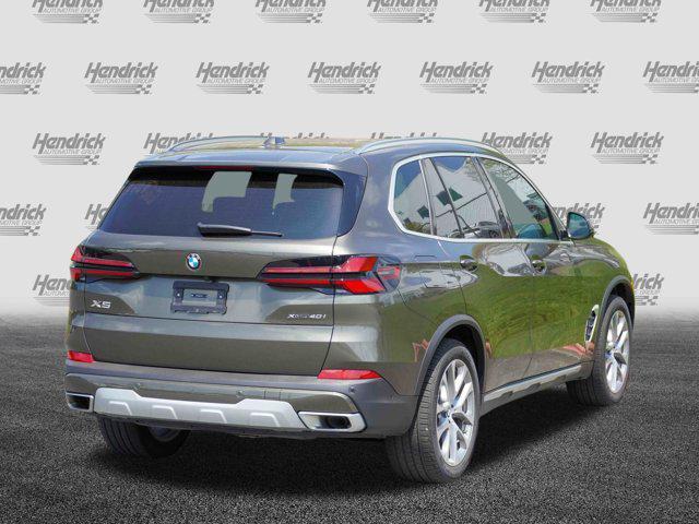 Photo of 2025 Manhattan Green Metallic BMW X5