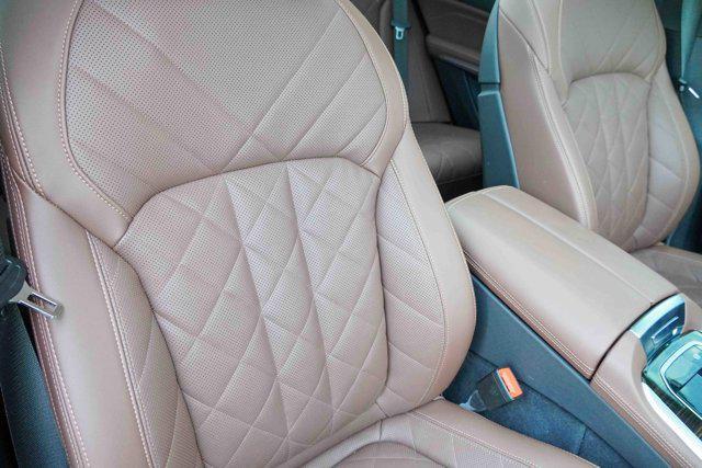 Photo of 2025 Manhattan Green Metallic BMW X5