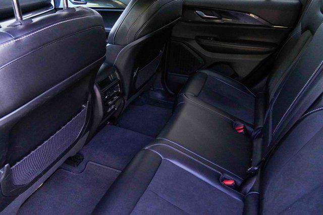 Photo of 2023 Diamond Black Crystal Pearlcoat Jeep Grand Cherokee